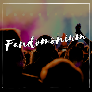Dark photo of people at a concert with the word fandomonium.