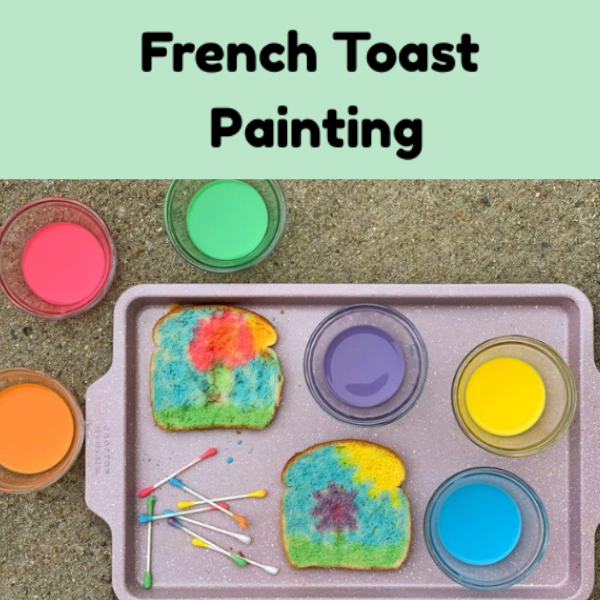 A baking tray with painted bread slices surrounded by bowls of colored liquids and cotton swabs.